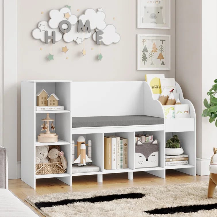 White cube bookcase with built-in bench and 7 adjustable open shelves in a kids’ playroom setting